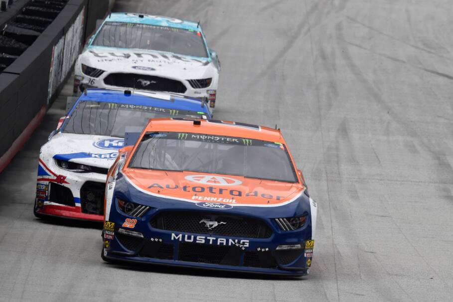 Logano couldn't catch up and finished third to lead the Mustangs. Logano couldn't catch up and finished third to lead the Mustangs.